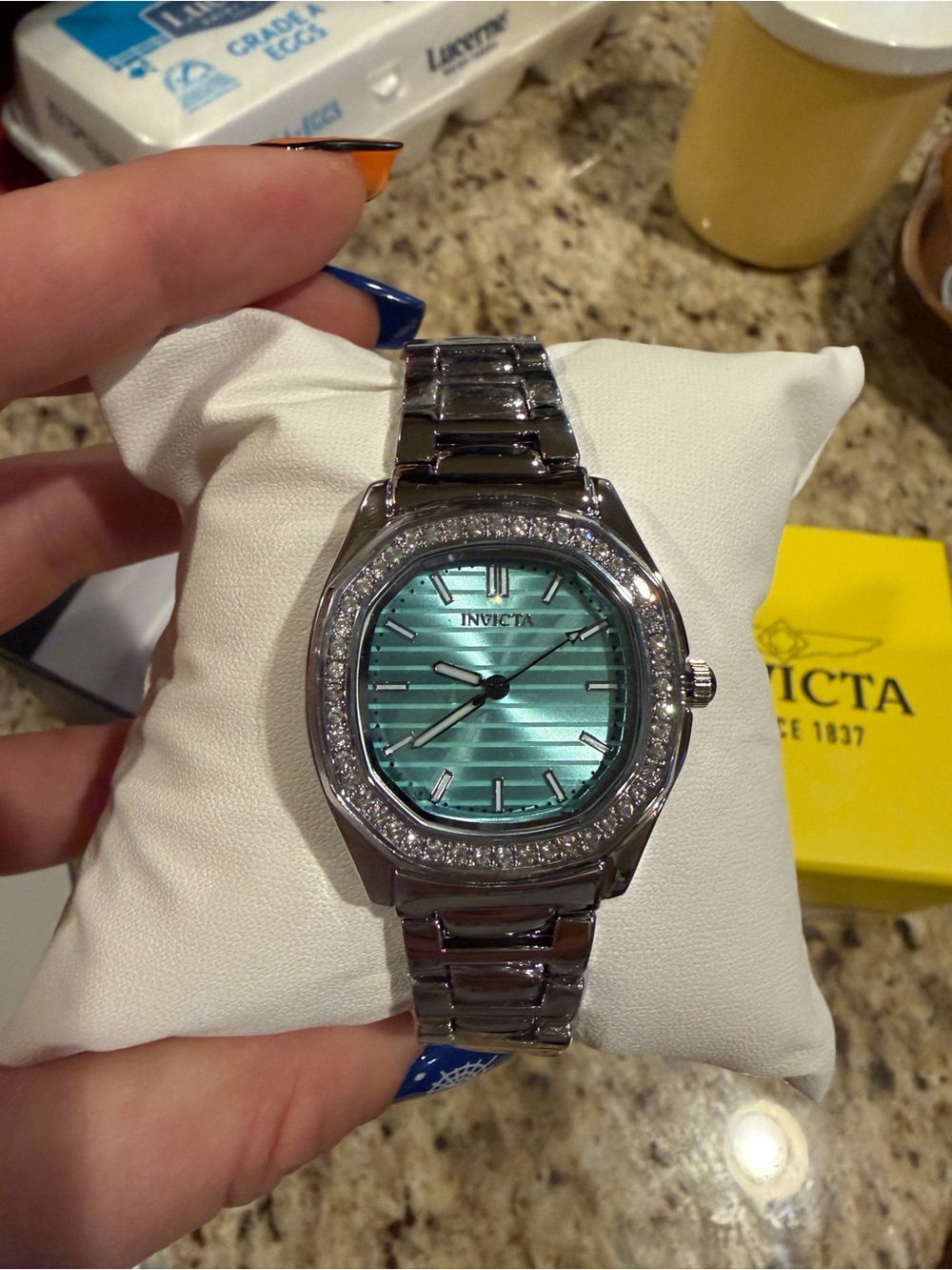 Invicta Silver Watch with Teal Sunburst Dial and Crystal Bezel